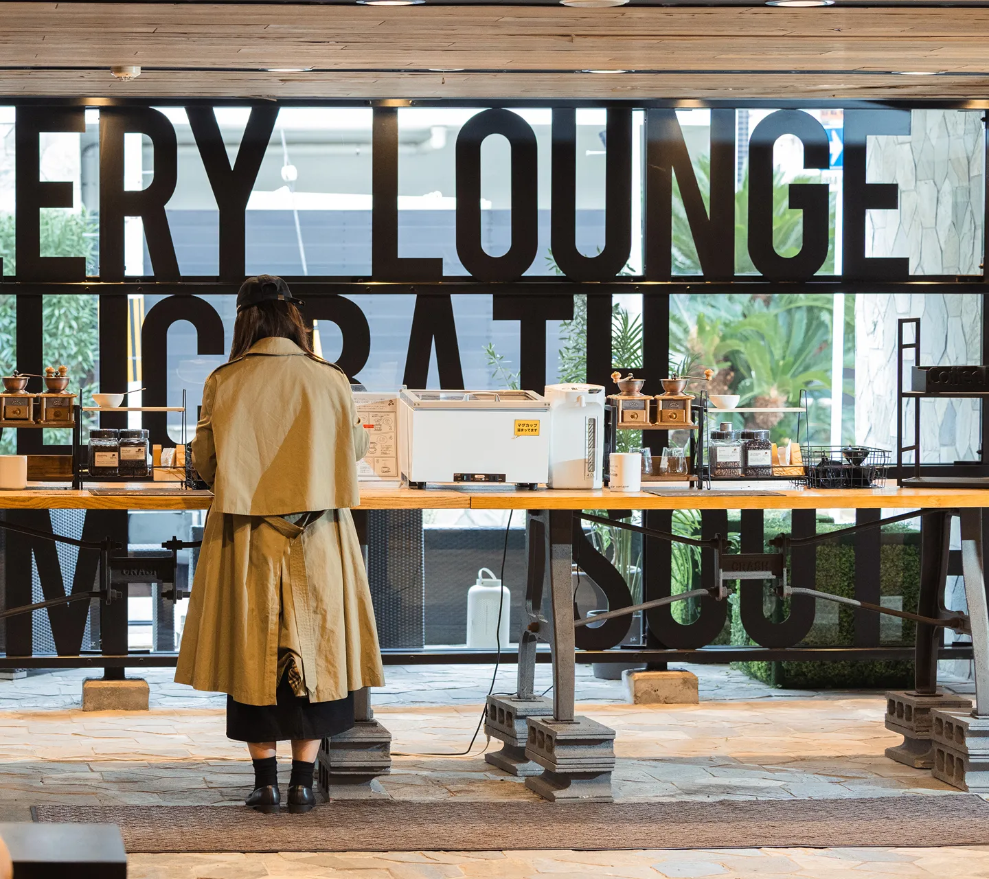 Guest brewing coffee in the lobby lounge