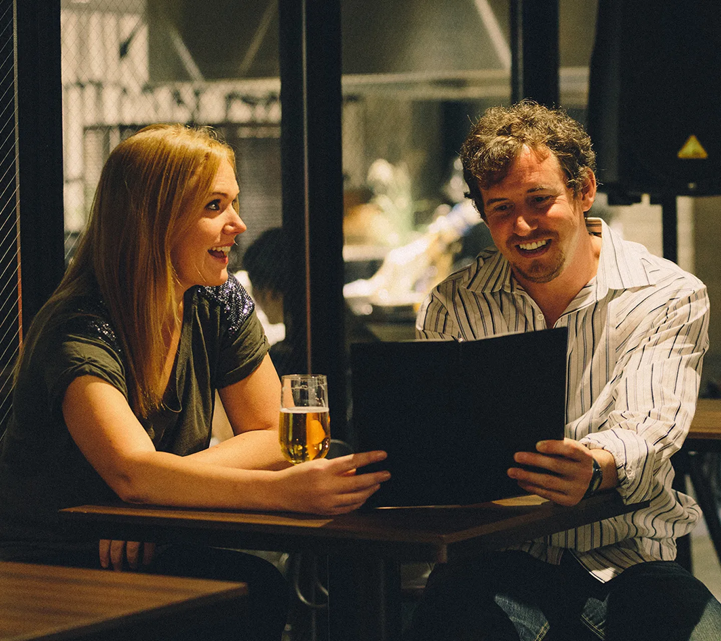 Guests chatting over a meal in the restaurant
