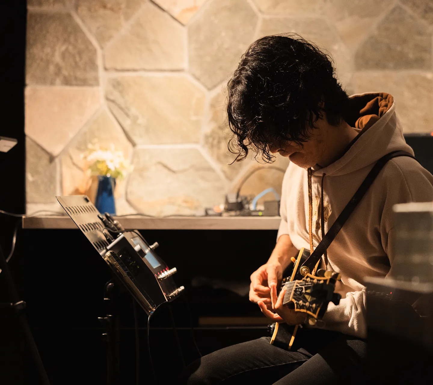 Guitarist performing at the Music Hour live event